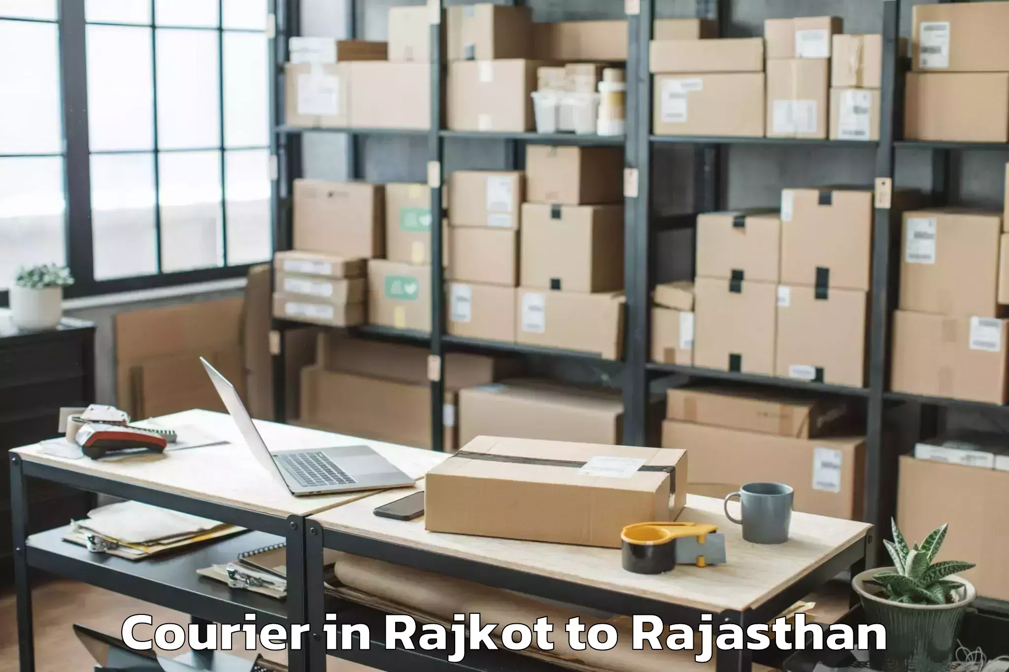 Book Rajkot to Basni Courier Online